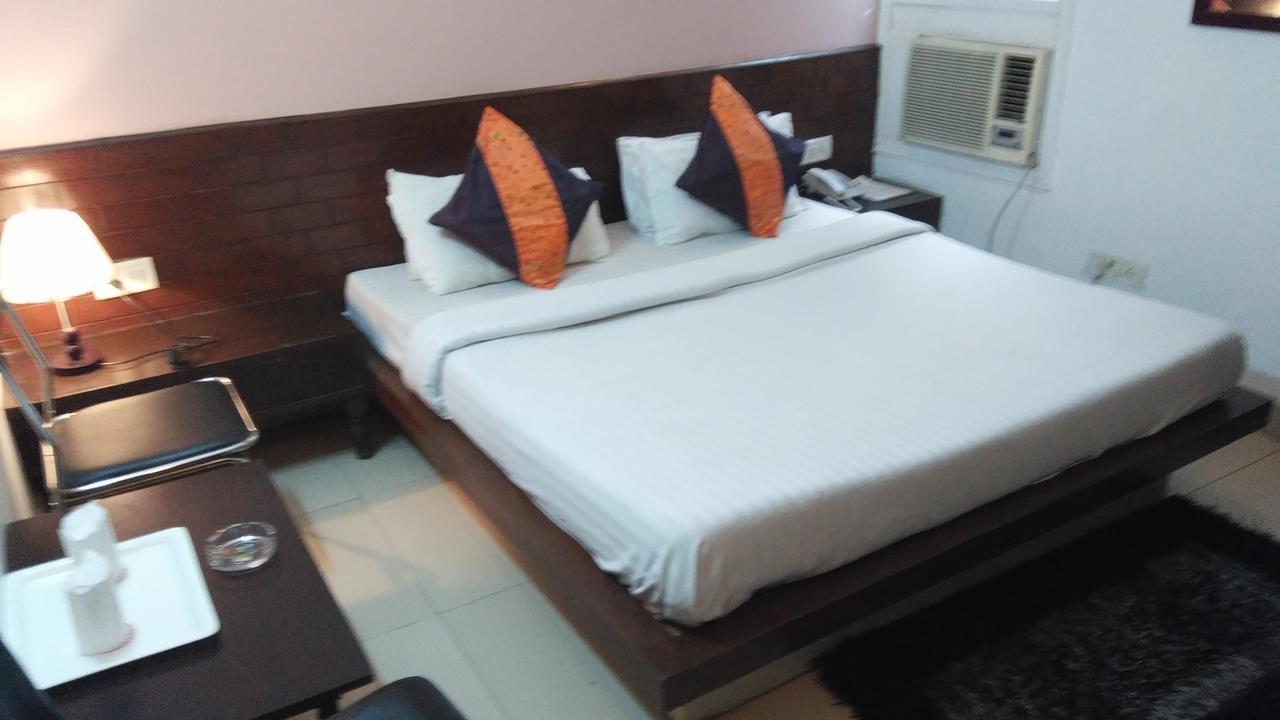 Airport Hotel Port View New Delhi Rom bilde